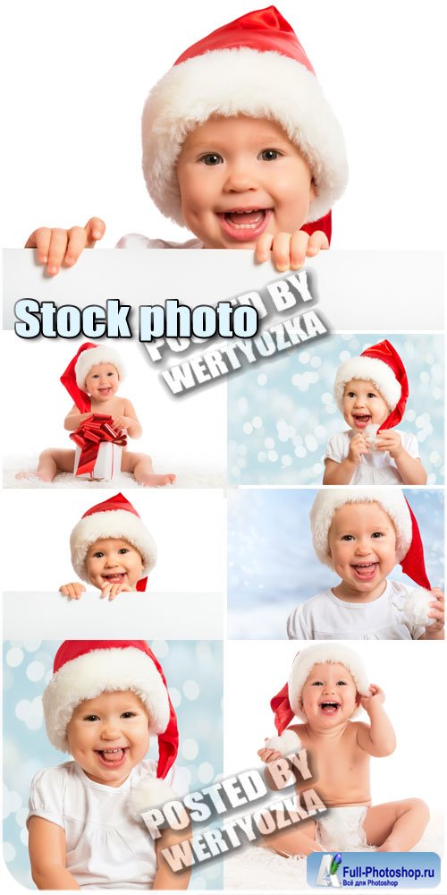     / Kid in Santa hats - stock photos