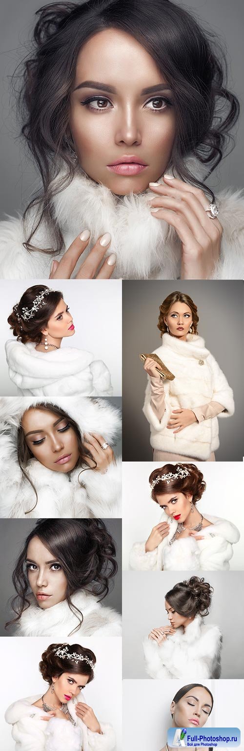 Christmas beautiful girl in white fur clothes with a hood