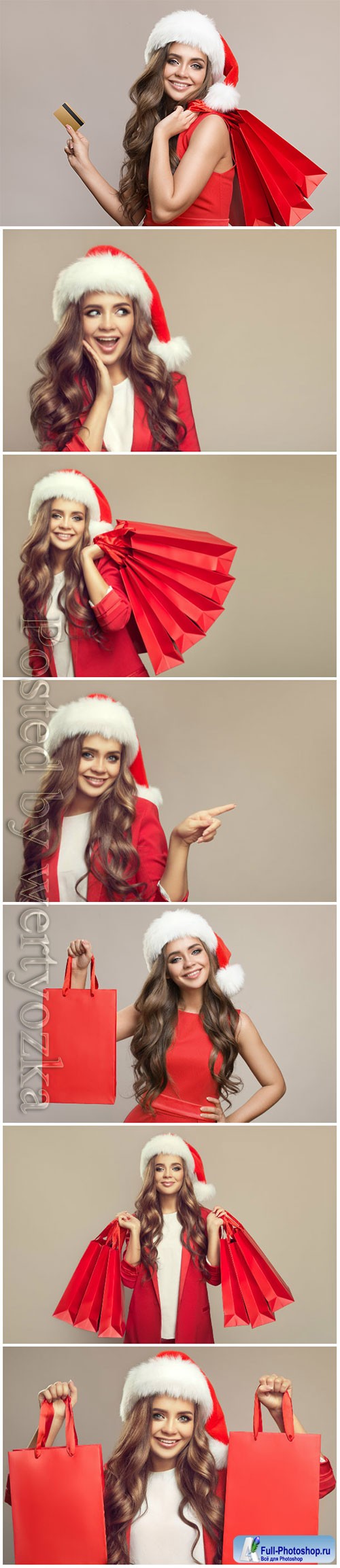 Woman, santa hat, holding, red, shopping, bags