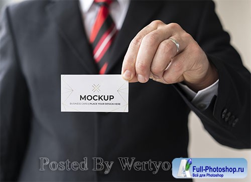 Man holding business card mock-up with one hand