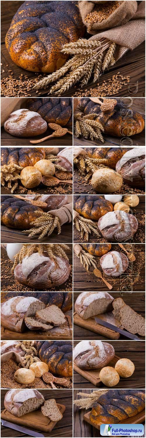 Wheat spikelets and fresh bread on wood background stock photo