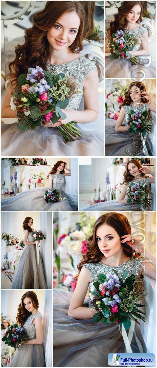 Girl in evening dress with a bouquet of flowers stock photo