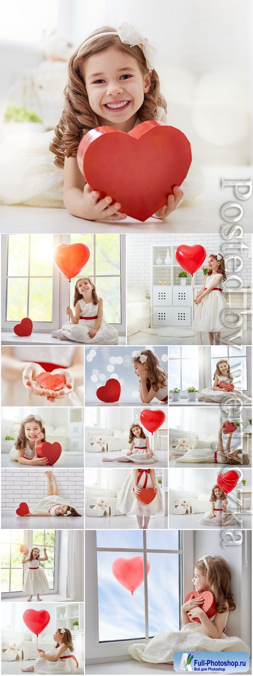 Smiling girl with red heart stock photo