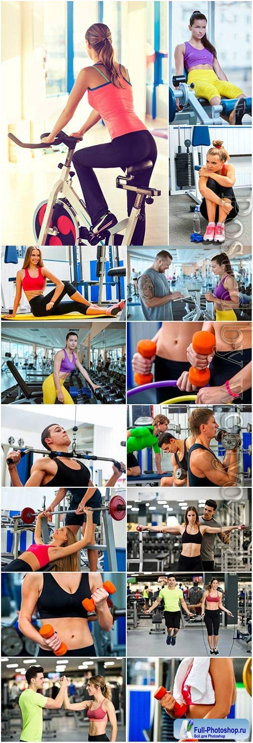 People exercising in the gym stock photo