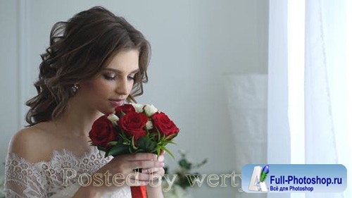 Beautiful Bride Smelling Wedding Bouquet